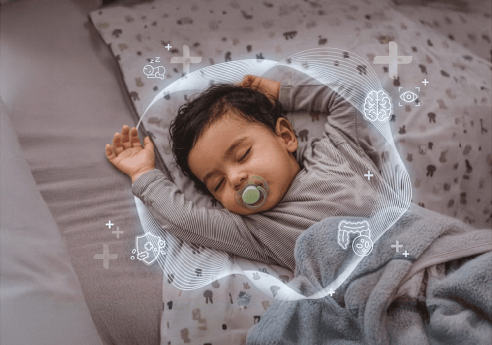 Baby sleeping comfortably after feed with Kabrita.
