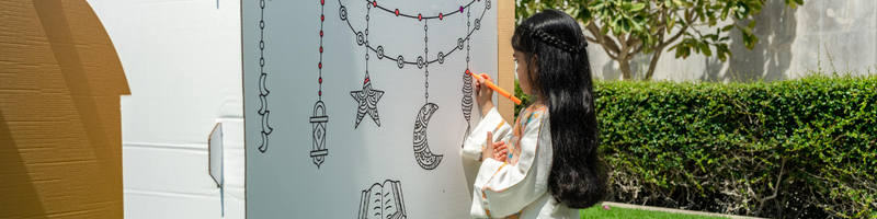 Little Girl Coloring the Eeezee Doodles Mosque